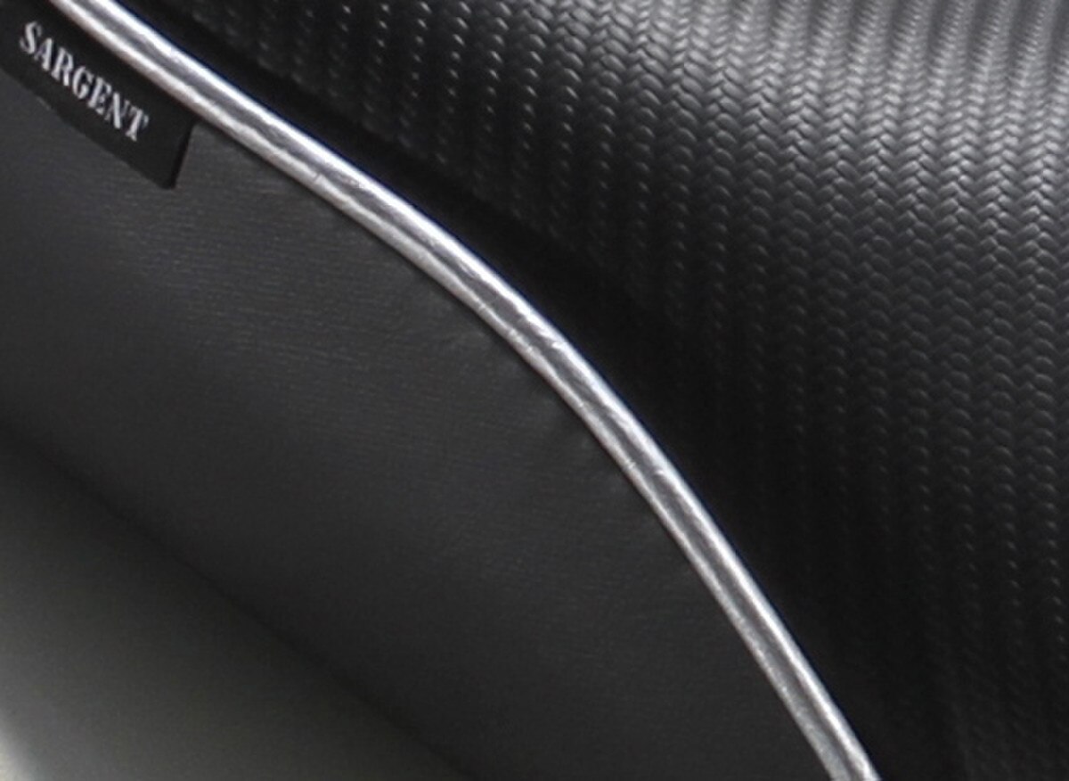 World Sport Motorcycle Seat for the Suzuki DL 650 2012-2016 detail of the CFX insert with silver welt on the low version seat.